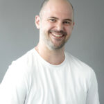 Thomas Gage, Briteweb's director of strategy, in a white t-shirt