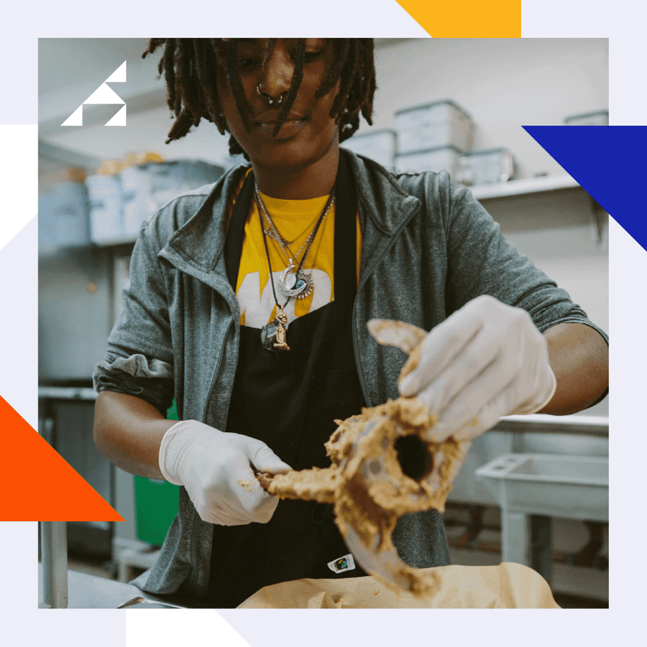 A man baking in a restaurant kitchen