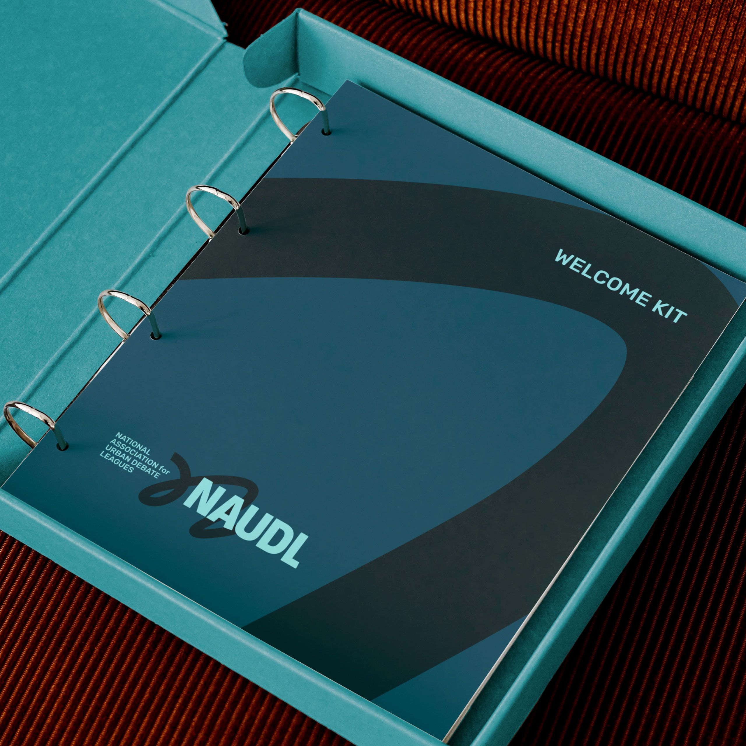binder with NAUDL logo